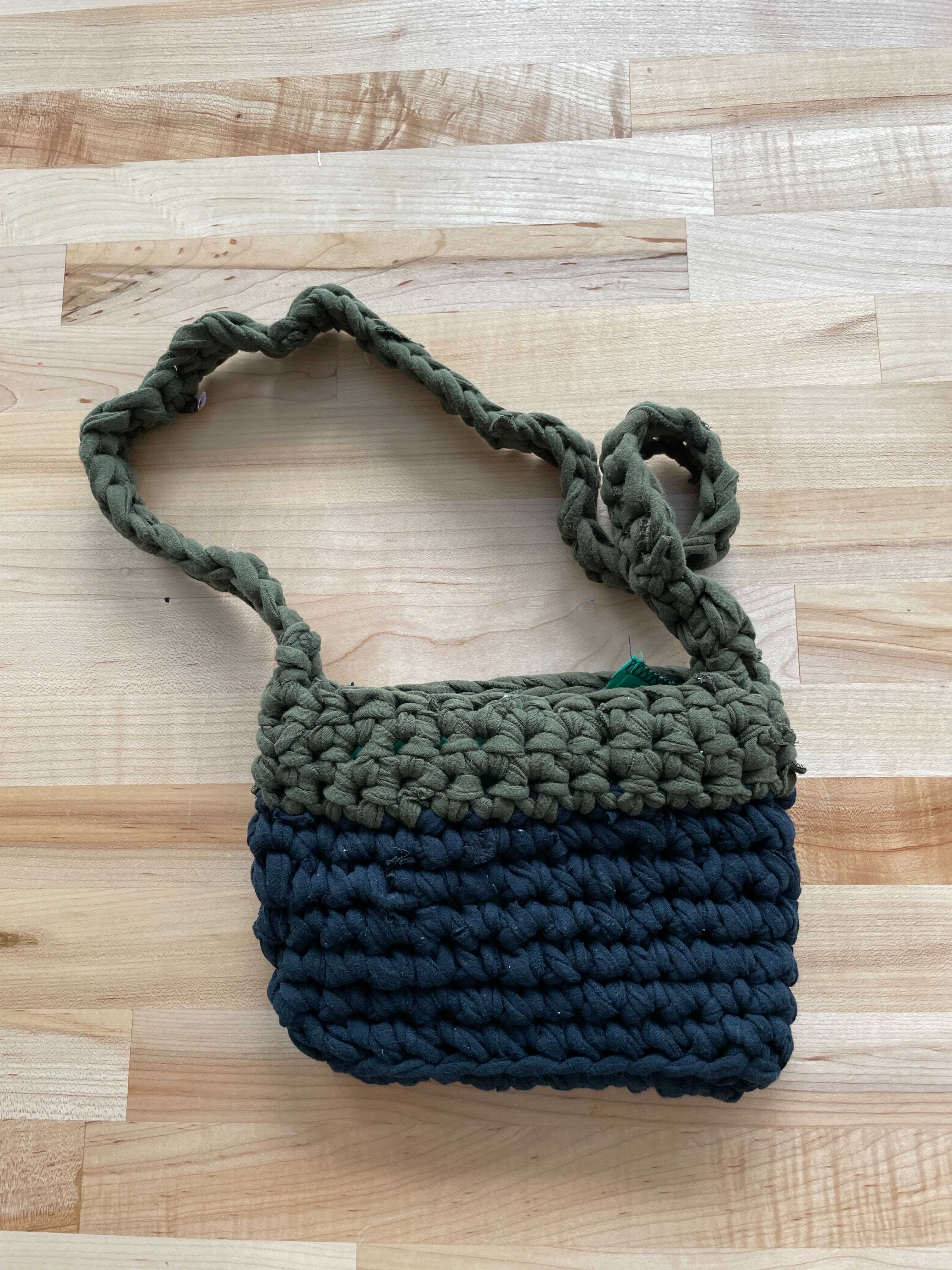 image of a crocheted bag made of strips of recycled t-shirts