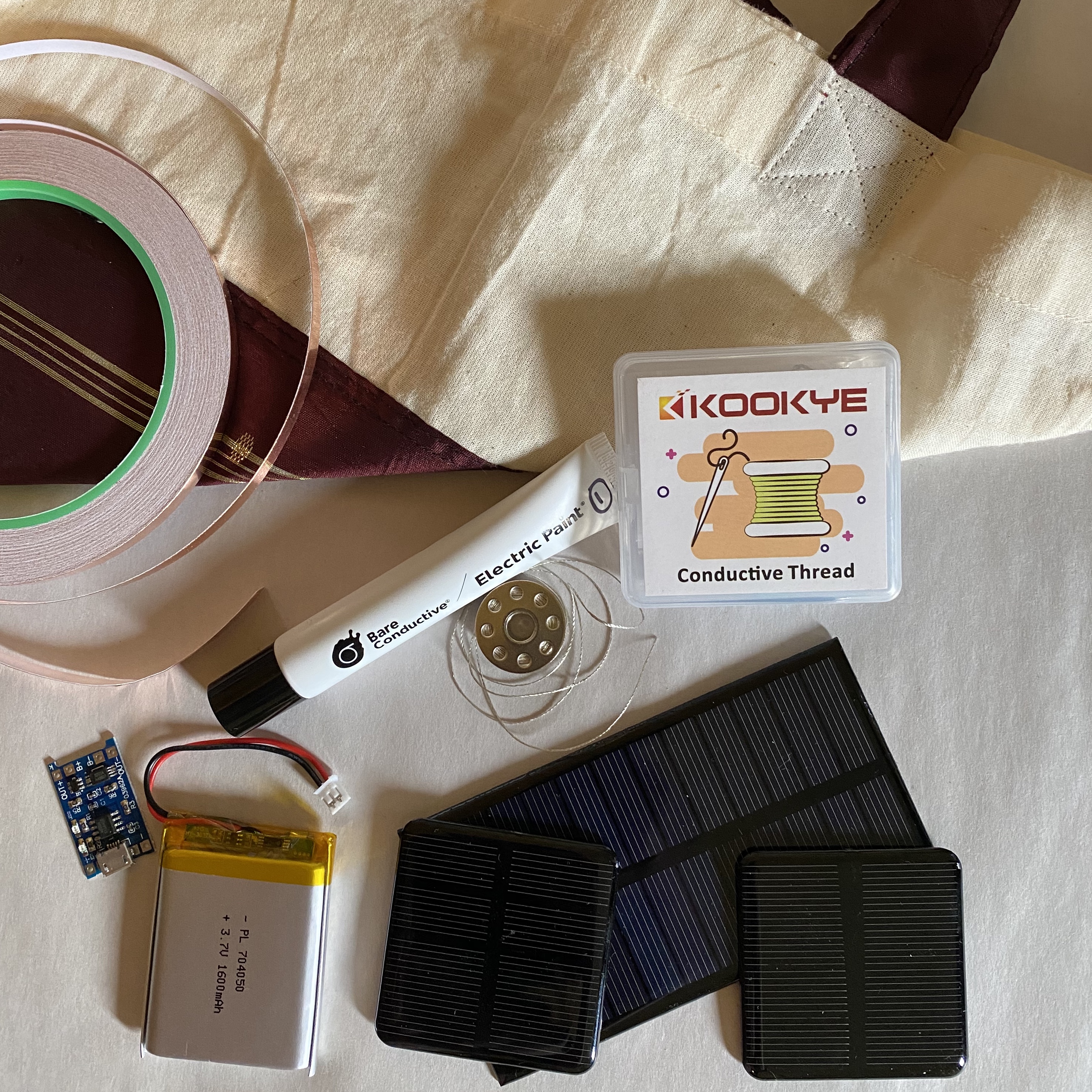 copper tape, solar panels, and tote bag