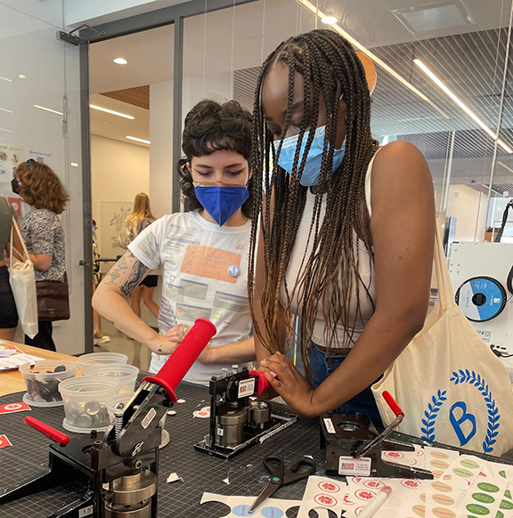 students making buttons