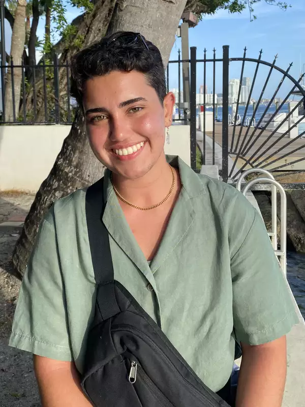 Image of Lili Seoror in a green shirt.
