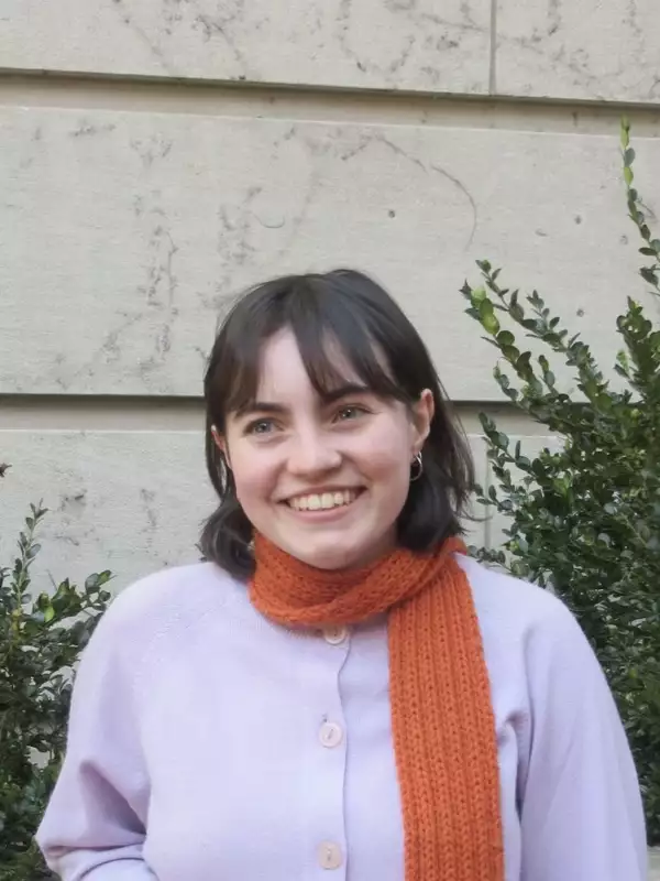 individual with short brown hair