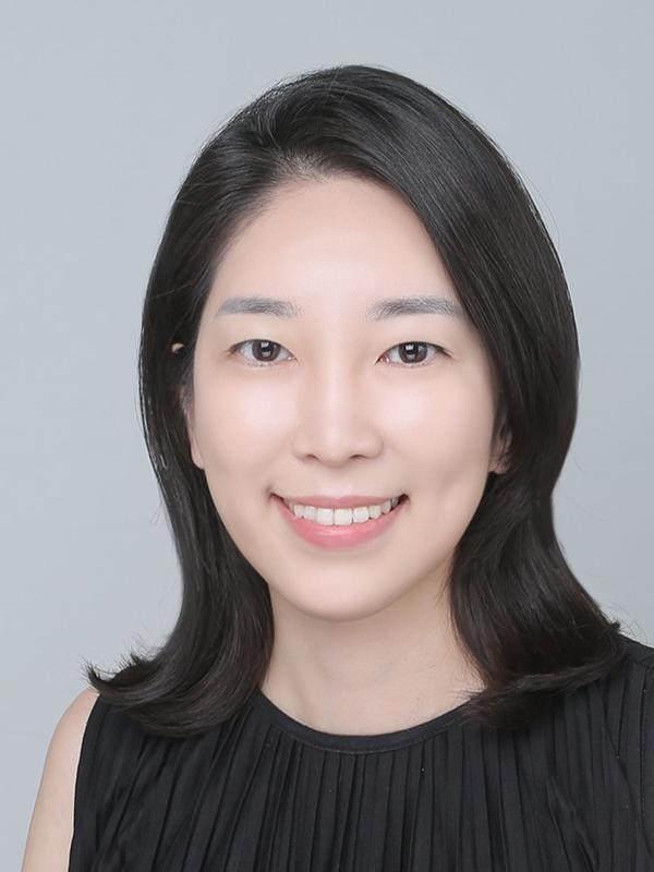 Headshot of Hyunsoo Alice Kim with solid gray background