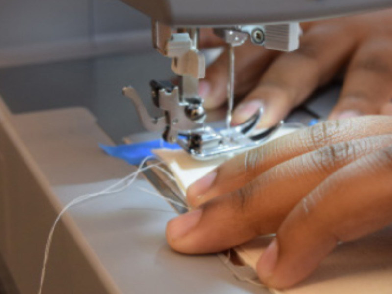 close up photo of sewing machine in use